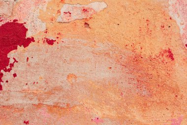 Çatlakları ve çizikleri olan beton bir duvarın dokusu arka plan olarak kullanılabilir.