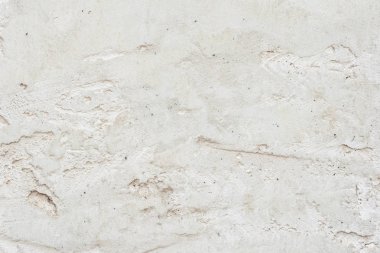 Çatlakları ve çizikleri olan beton bir duvarın dokusu arka plan olarak kullanılabilir.