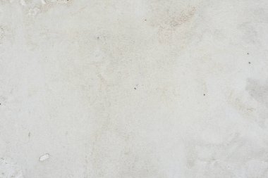 Çatlakları ve çizikleri olan beton bir duvarın dokusu arka plan olarak kullanılabilir.