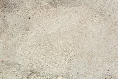 Çatlakları ve çizikleri olan beton bir duvarın dokusu arka plan olarak kullanılabilir.
