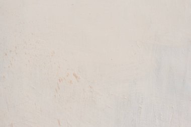 Çatlakları ve çizikleri olan beton bir duvarın dokusu arka plan olarak kullanılabilir.