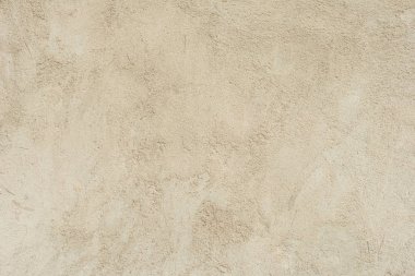 Çatlakları ve çizikleri olan beton bir duvarın dokusu arka plan olarak kullanılabilir.