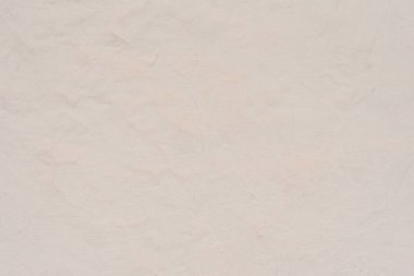 Çatlakları ve çizikleri olan beton bir duvarın dokusu arka plan olarak kullanılabilir.