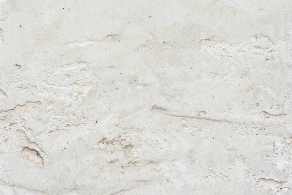 Çatlakları ve çizikleri olan beton bir duvarın dokusu arka plan olarak kullanılabilir.