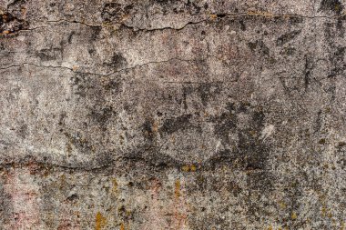 Çatlakları ve çizikleri olan beton bir duvarın dokusu arka plan olarak kullanılabilir.