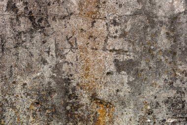 Çatlakları ve çizikleri olan beton bir duvarın dokusu arka plan olarak kullanılabilir.