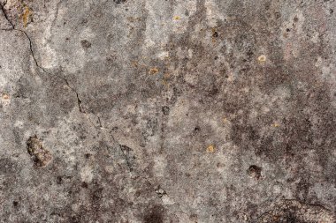 Doku, duvar, beton, arka plan olarak kullanılabilir. Çizik ve çatlaklarla dolu bir duvar parçası.