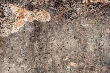 Doku, duvar, beton, arka plan olarak kullanılabilir. Çizik ve çatlaklarla dolu bir duvar parçası.