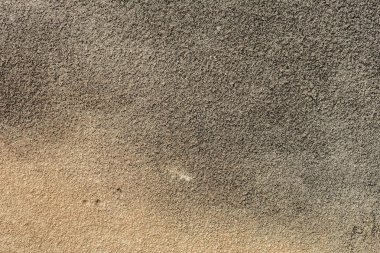 Doku, duvar, beton, arka plan olarak kullanılabilir. Çizik ve çatlaklarla dolu bir duvar parçası.