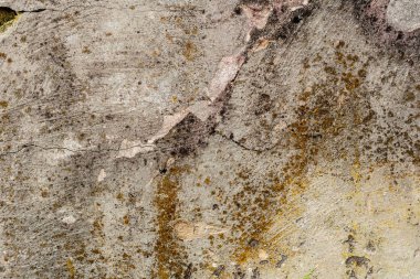 Doku, duvar, beton, arka plan olarak kullanılabilir. Çizik ve çatlaklarla dolu bir duvar parçası.