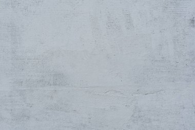 Doku, duvar, beton, arka plan olarak kullanılabilir. Çizik ve çatlaklarla dolu bir duvar parçası.