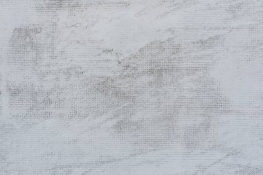 Çatlakları ve çizikleri olan beton bir duvarın dokusu arka plan olarak kullanılabilir.