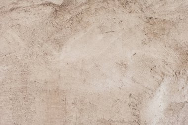 Çatlakları ve çizikleri olan beton bir duvarın dokusu arka plan olarak kullanılabilir.