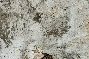 Doku, duvar, beton, arka plan olarak kullanılabilir. Çizik ve çatlaklarla dolu bir duvar parçası.