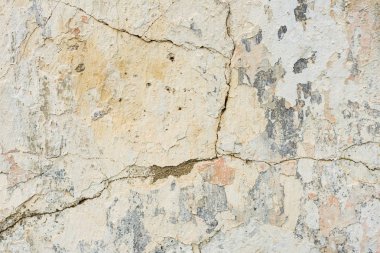 Doku, duvar, beton, arka plan olarak kullanılabilir. Çizik ve çatlaklarla dolu bir duvar parçası.