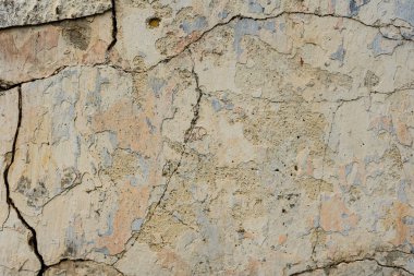 Doku, duvar, beton, arka plan olarak kullanılabilir. Çizik ve çatlaklarla dolu bir duvar parçası.