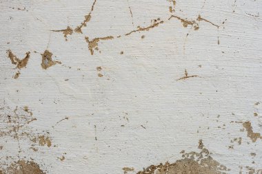 Doku, duvar, beton, arka plan olarak kullanılabilir. Çizik ve çatlaklarla dolu bir duvar parçası.