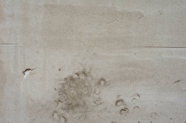 Doku, duvar, beton, arka plan olarak kullanılabilir. Çizik ve çatlaklarla dolu bir duvar parçası.