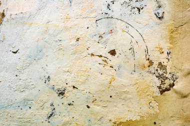 Çatlakları ve çizikleri olan beton bir duvarın dokusu arka plan olarak kullanılabilir.