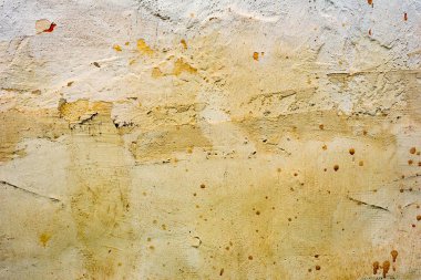 Çatlakları ve çizikleri olan beton bir duvarın dokusu arka plan olarak kullanılabilir.