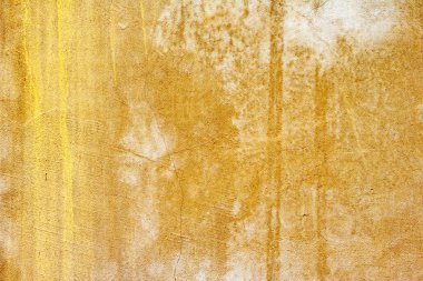 Çatlakları ve çizikleri olan beton bir duvarın dokusu arka plan olarak kullanılabilir.