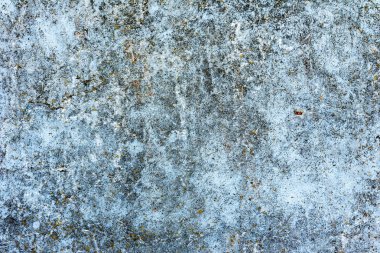 Çatlakları ve çizikleri olan beton bir duvarın dokusu arka plan olarak kullanılabilir.