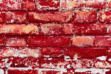Çatlakları ve çizikleri olan tuğla duvar dokusu arka plan olarak kullanılabilir.