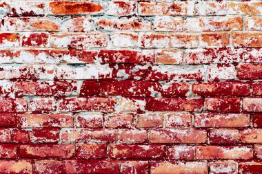 Çatlakları ve çizikleri olan tuğla duvar dokusu arka plan olarak kullanılabilir.