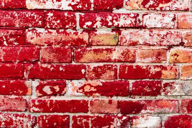 Çatlakları ve çizikleri olan tuğla duvar dokusu arka plan olarak kullanılabilir.