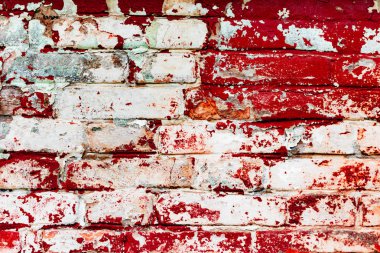 Çatlakları ve çizikleri olan tuğla duvar dokusu arka plan olarak kullanılabilir.