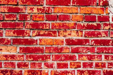 Çatlakları ve çizikleri olan tuğla duvar dokusu arka plan olarak kullanılabilir.