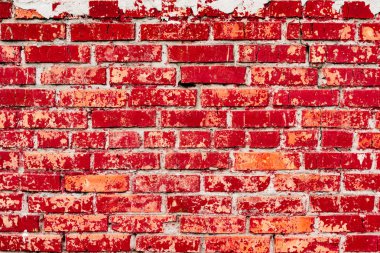 Çatlakları ve çizikleri olan tuğla duvar dokusu arka plan olarak kullanılabilir.