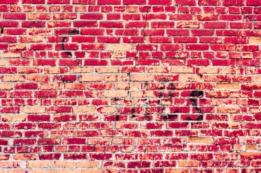 Çatlakları ve çizikleri olan tuğla duvar dokusu arka plan olarak kullanılabilir.