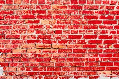 Çatlakları ve çizikleri olan tuğla duvar dokusu arka plan olarak kullanılabilir.