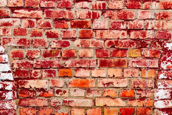 Çatlakları ve çizikleri olan tuğla duvar dokusu arka plan olarak kullanılabilir.