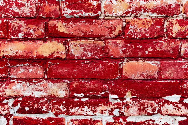 Çatlakları ve çizikleri olan tuğla duvar dokusu arka plan olarak kullanılabilir.