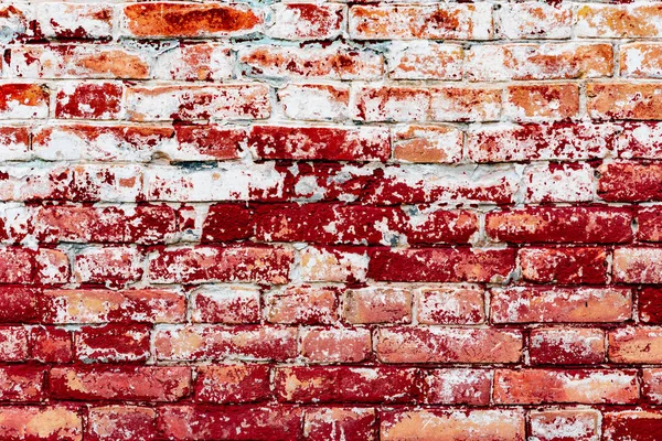 Çatlakları ve çizikleri olan tuğla duvar dokusu arka plan olarak kullanılabilir.