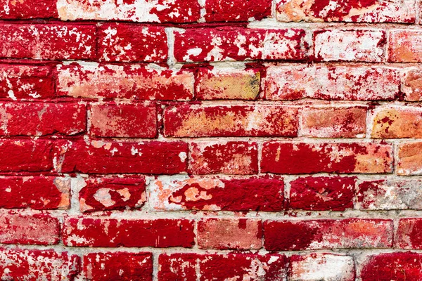 Çatlakları ve çizikleri olan tuğla duvar dokusu arka plan olarak kullanılabilir.