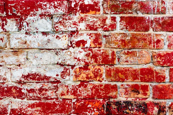 Çatlakları ve çizikleri olan tuğla duvar dokusu arka plan olarak kullanılabilir.