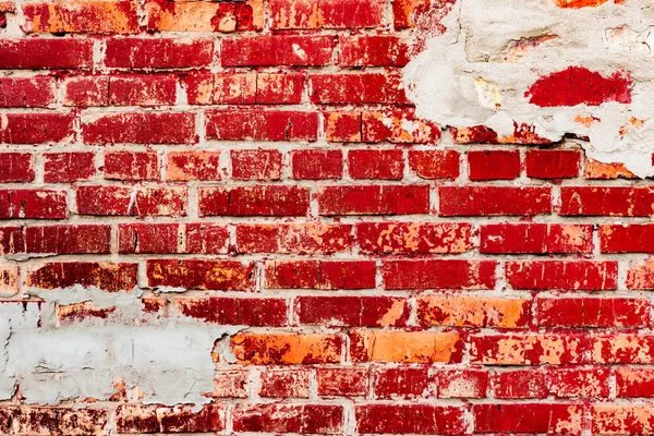 Çatlakları ve çizikleri olan tuğla duvar dokusu arka plan olarak kullanılabilir.