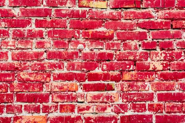 Çatlakları ve çizikleri olan tuğla duvar dokusu arka plan olarak kullanılabilir.