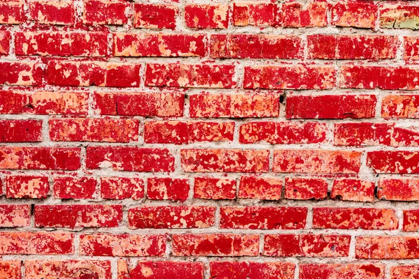 Çatlakları ve çizikleri olan tuğla duvar dokusu arka plan olarak kullanılabilir.