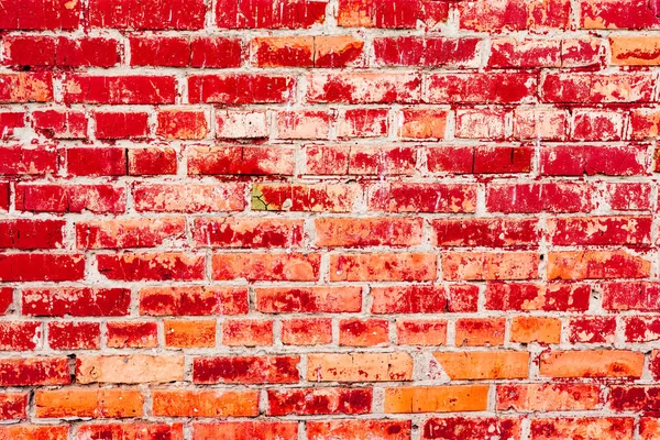 Çatlakları ve çizikleri olan tuğla duvar dokusu arka plan olarak kullanılabilir.