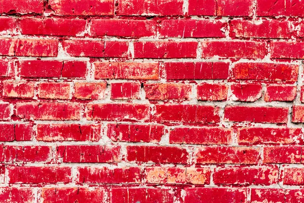 Çatlakları ve çizikleri olan tuğla duvar dokusu arka plan olarak kullanılabilir.