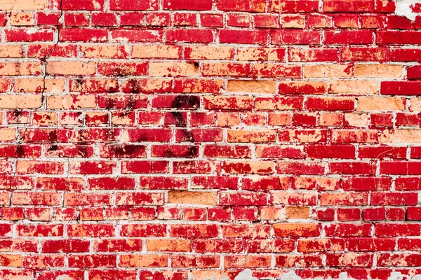 Çatlakları ve çizikleri olan tuğla duvar dokusu arka plan olarak kullanılabilir.