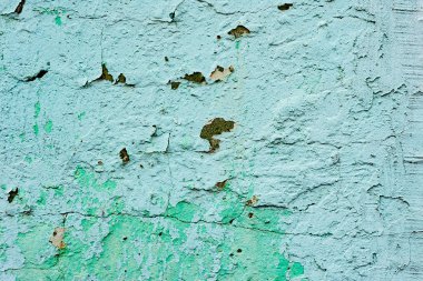 Çatlakları ve çizikleri olan beton bir duvarın dokusu arka plan olarak kullanılabilir.