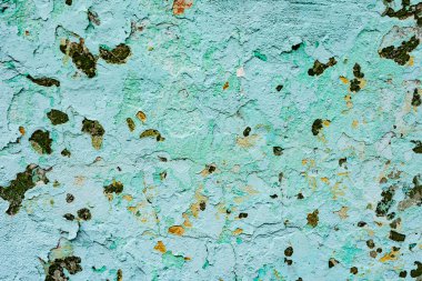 Çatlakları ve çizikleri olan beton bir duvarın dokusu arka plan olarak kullanılabilir.