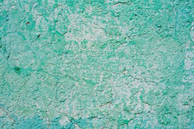 Çatlakları ve çizikleri olan beton bir duvarın dokusu arka plan olarak kullanılabilir.