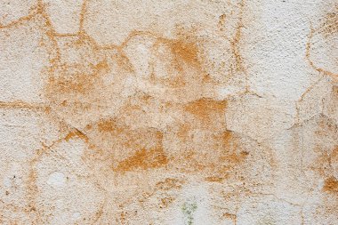 Çatlakları ve çizikleri olan beton bir duvarın dokusu arka plan olarak kullanılabilir.