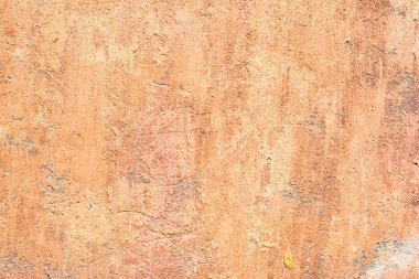 Çatlakları ve çizikleri olan beton bir duvarın dokusu arka plan olarak kullanılabilir.